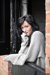 The second photo set of Tess and a big wooly jumper and very little else. - Photo #1