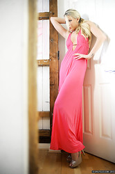 Danielle poses and strips out of her elegant pink evening dress. - Photo #1