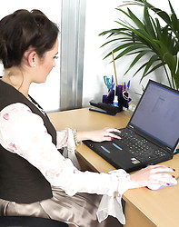 Sexy brunette secretary teases in office - Photo #2