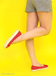 Pretty brunette tourist strips from her shorts and summer top. - Photo #6