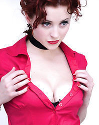 Gorgeous red head in short skirt and stockings teases off her clothes - Photo #8