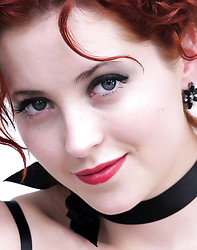 Gorgeous red head in short skirt and stockings teases off her clothes - Photo #12