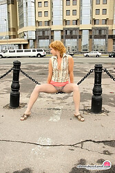 Sensuous outdoor upskirt tease performed by the teen in grey pantyhose - Photo #1