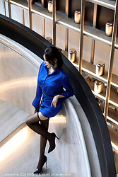 Hot asian office girl in black stockings and high heels - Photo #1