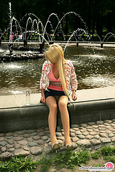 Playful chick and the idea of showing off her pretty pussy through the pantyhose doesn’t bother her a bit. - Photo #1