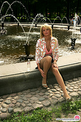 Playful chick and the idea of showing off her pretty pussy through the pantyhose doesn’t bother her a bit. - Photo #2