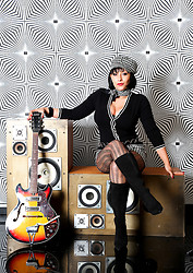 The Swinging Sixties. Retro Danica in 60s style mini skirt, pantyhose and boots - Photo #1