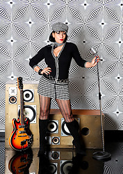 The Swinging Sixties. Retro Danica in 60s style mini skirt, pantyhose and boots - Photo #2