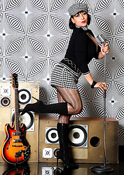 The Swinging Sixties. Retro Danica in 60s style mini skirt, pantyhose and boots - Photo #4