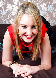 Katie-Kay strips to her shoes to finger and toy her pussy on the bed - Photo #2