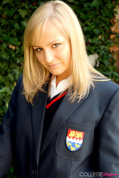 Kelly strips that schoolgirl uniform right off, black bra barely containing those perky tits underneath - Photo #2