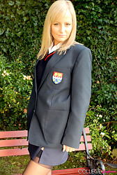 Kelly strips that schoolgirl uniform right off, black bra barely containing those perky tits underneath - Photo #3