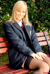 Kelly strips that schoolgirl uniform right off, black bra barely containing those perky tits underneath - Photo #7