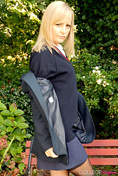 Kelly strips that schoolgirl uniform right off, black bra barely containing those perky tits underneath - Photo #8