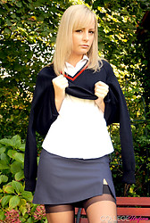 Kelly strips that schoolgirl uniform right off, black bra barely containing those perky tits underneath - Photo #12