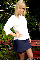 Kelly strips that schoolgirl uniform right off, black bra barely containing those perky tits underneath - Photo #15