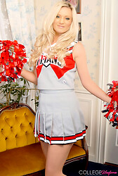 Pretty Emma Clare shakes her pom-poms as she peels that uniform off those perky tits - Photo #3
