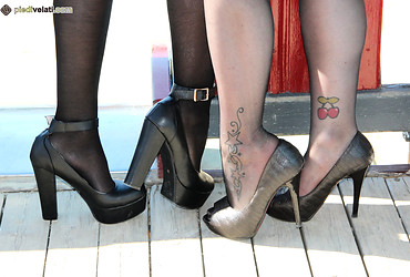 Chiara wiggles her toes in sheer nylons while stretching long Italian legs across silk sheets - Photo #8