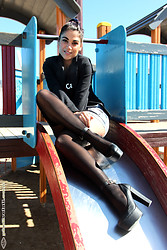 Chiara wiggles her toes in sheer nylons while stretching long Italian legs across silk sheets - Photo #11