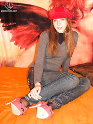 Eleonora shows off every sexy inch of those pantyhose-clad legs - Photo #1