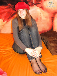 Eleonora shows off every sexy inch of those pantyhose-clad legs - Photo #9