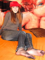 Eleonora shows off every sexy inch of those pantyhose-clad legs - Photo #10
