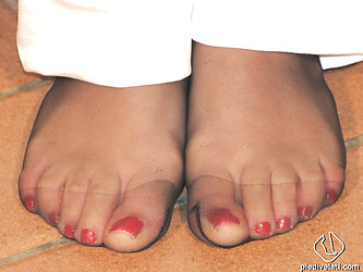 22-year-old Imma spreads her legs, revealing the ultimate foot fetish fantasy with her stunning long limbs. - Photo #6