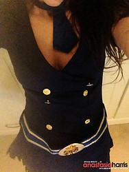 British glamour model Anastasia Harris shows off her stocking-clad thighs during a photoshoot. - Photo #2