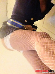 British glamour model Anastasia Harris shows off her stocking-clad thighs during a photoshoot. - Photo #7